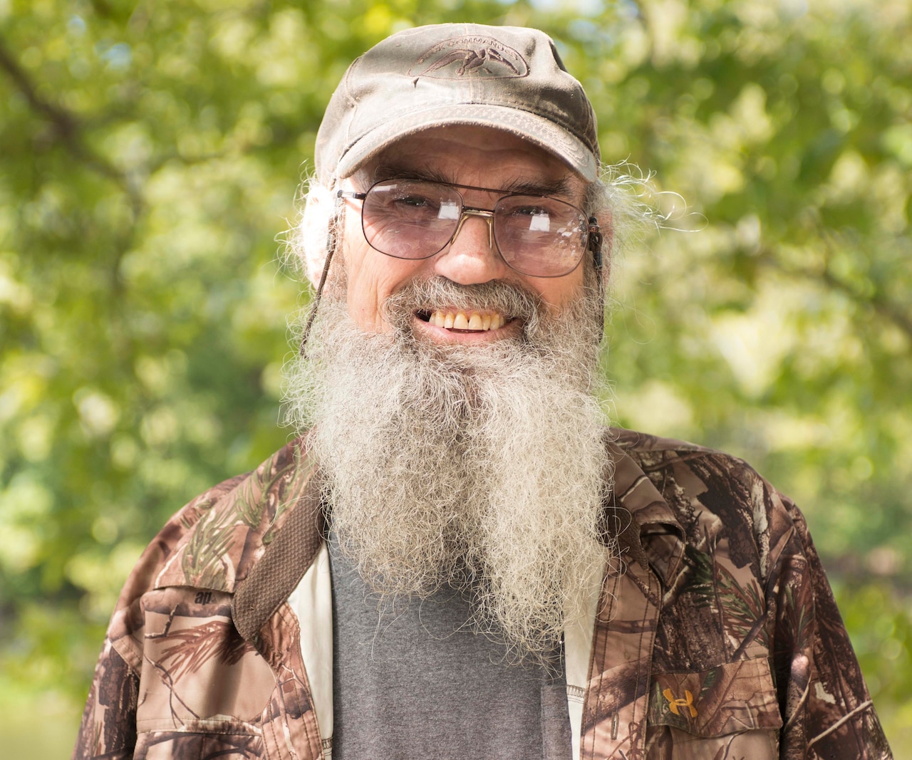 A man smiles for the camera.