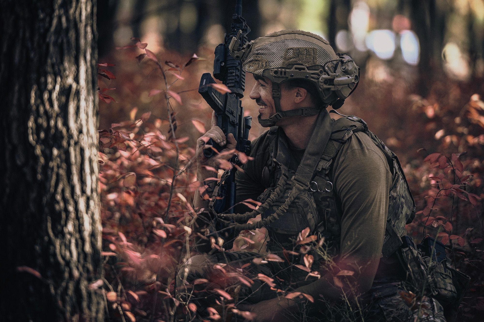 U.S. Air Force Senior Airman Clayton Gagliastri, 87th Explosive Ordnance Disposal technician, guards his position during Operation Honey Badger at Joint Base McGuire-Dix-Lakehurst, N.J., Oct. 24, 2024. Operation Honey Badger was an exercise to prepare participants for austere troop deployment and collaboration between separate career fields. (U.S. Air Force photo by Staff Sgt. Austin Knox)