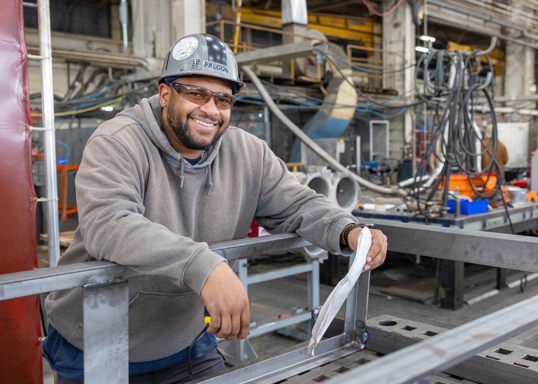 Adrian Falcon, U.S. Army 
Work Lead Shop 11, Shipfitters 
“I loved serving with my fellow brothers and sisters in arms; knowing we all had the same goal — to come home. It was important because you can experience challenges in life that you never knew you could overcome, but yet, when challenged, you overcome it and feel that sense of heightened pride.” (U.S. Navy photo by Wendy Hallmark)
