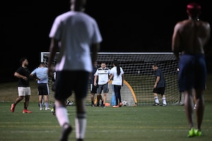 Service members and civilians unite for a pickup soccer game at Joint Base Andrews, Md., Oct. 31, 2024. By enhancing teamwork and resilience, these games contribute to building a more supportive and cohesive community at Andrews. (U.S. Air Force photo by Airman 1st Class Gianluca Ciccopiedi)