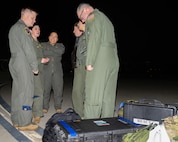 Airmen from the 625th Strategic Operations Squadron out of Offutt Air Force Base, Nebraska, prepare to board a U.S. Navy E-6B Mercury aircraft prior to the test launch of an unarmed Minuteman III intercontinental ballistic missile Nov. 5, 2024, from Vandenberg Space Force Base, California. This test, launched by the STOS team from the air, demonstrated the reliability and accuracy of the Airborne Launch Control System. (U.S. Air Force photo by Airman 1st Class Alyssa Bankston)