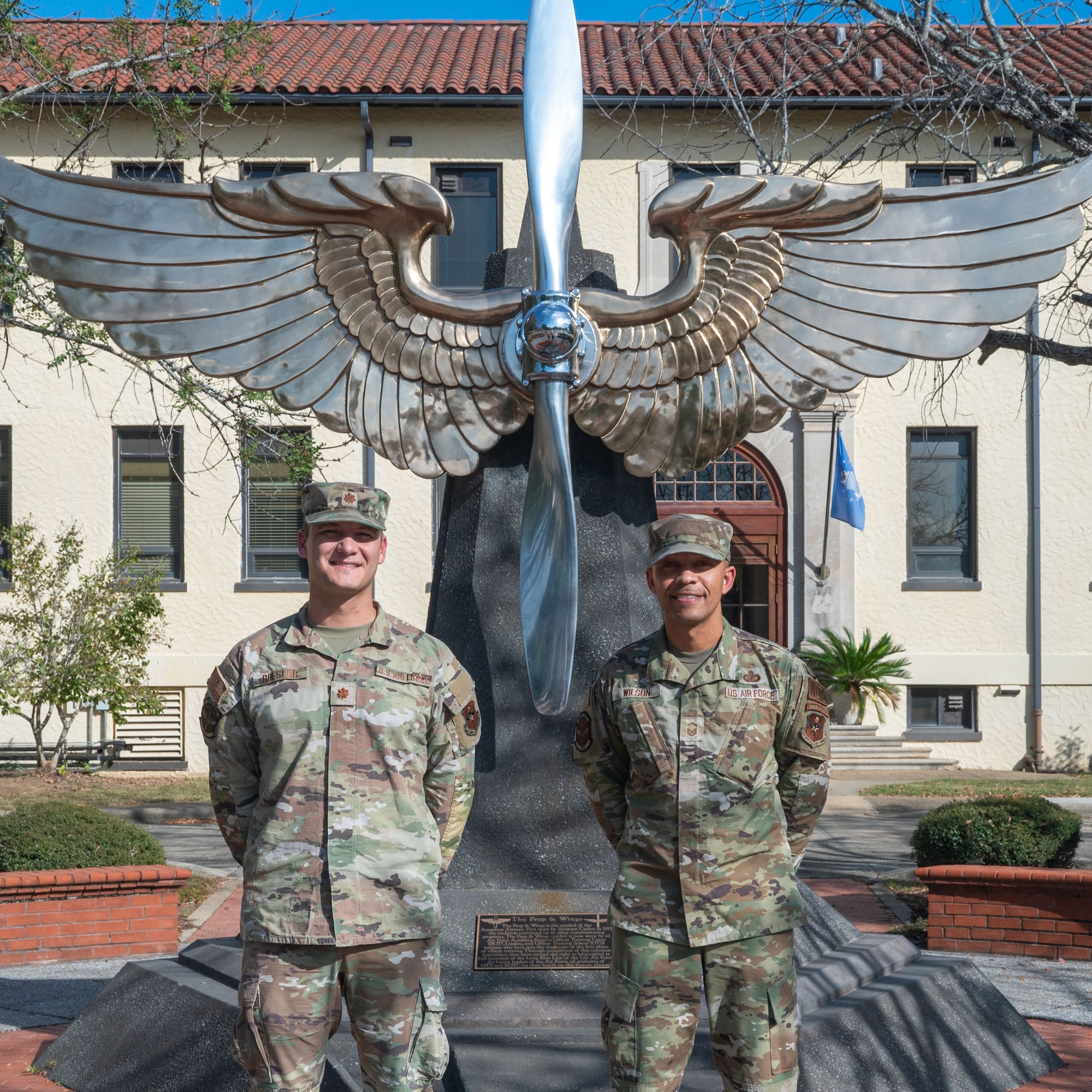 Maj. Nathaniel Roesler, Warrant Officer Training School commandant, and Senior Master Sgt. Jarvis Wilson, WOTS senior enlisted leader, pose for a photo at Maxwell Air Force Base, Alabama, Oct. 31, 2024.  Since the Department of Air Force announced the establishment of Warrant Officer Training School at Maxwell Air Force Base, Alabama, Roesler and Wilson have worked to build a school to answer the Great Power Competition call. (U.S. Air Force photo by Senior Airman Evan Porter)