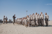 U.S. Marine Corps Martial Arts Instructor, Sgt. Thierno Jalloh, with Support Battalion, Recruit Training Regiment, conducts a roll call of recruits with Kilo Company, 3rd Recruit Training Battalion, before they conduct a Marine Corps Martial Arts Program techniques test at Marine Corps Recruit Depot San Diego, California, Oct. 24, 2024. MCMAP aims to strengthen the mental and moral resiliency of recruits and Marines through realistic combative training, warrior ethos studies, and physical hardening. (U.S. Marine Corps photo by Cpl. Sarah M. Grawcock)