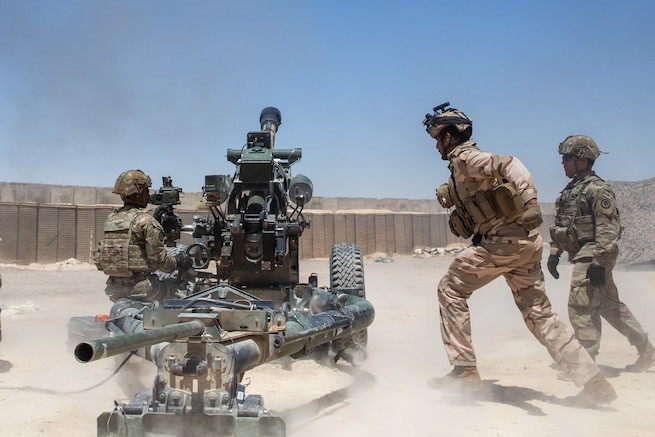 Field artillerymen from the New Jersey Army National Guard’s 3rd Battalion, 112th Field Artillery Regiment, 44th Infantry Brigade Combat Team, perform a live fire exercise with their counterparts from the Iraqi Division of Artillery’s 1st Brigade, in western Iraq, July 31, 2024. Advising, assisting, and enabling are key components of Combined Joint Task Force - Operation Inherent Resolve’s mission to enhance partner capacity in Iraq to ensure the enduring defeat of Da’esh. (U.S. Army photo)