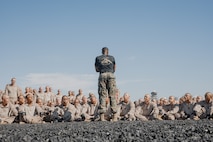 U.S. Marine Corps Martial Arts Instructor, Sgt. Thierno Jalloh, with Support Battalion, Recruit Training Regiment, gives a brief to recruits with Kilo Company, 3rd Recruit Training Battalion, before they conduct a Marine Corps Martial Arts Program techniques test at Marine Corps Recruit Depot San Diego, California, Oct. 24, 2024. MCMAP aims to strengthen the mental and moral resiliency of recruits and Marines through realistic combative training, warrior ethos studies, and physical hardening. (U.S. Marine Corps photo by Cpl. Sarah M. Grawcock)