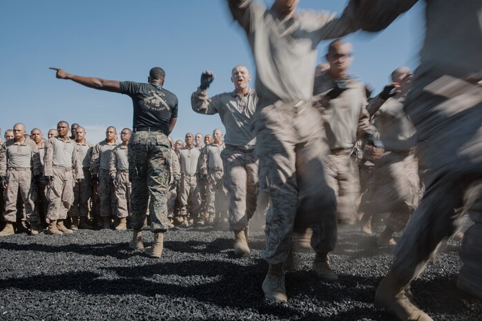 U.S. Marine Corps Martial Arts Instructor, Sgt. Thierno Jalloh, with Support Battalion, Recruit Training Regiment, instructs recruits with Kilo Company, 3rd Recruit Training Battalion, into the Marine Corps Martial Arts Program techniques testing pit at Marine Corps Recruit Depot San Diego, California, Oct. 24, 2024. MCMAP aims to strengthen the mental and moral resiliency of recruits and Marines through realistic combative training, warrior ethos studies, and physical hardening. (U.S. Marine Corps photo by Cpl. Sarah M. Grawcock)