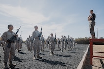 U.S. Marine Corps Martial Arts Instructor, Staff Sgt. Jacob Sinclair, with Support Battalion, Recruit Training Regiment, instructs recruits with Kilo Company, 3rd Recruit Training Battalion during their Marine Corps Martial Arts Program techniques test at Marine Corps Recruit Depot San Diego, California, Oct. 24, 2024. MCMAP aims to strengthen the mental and moral resiliency of recruits and Marines through realistic combative training, warrior ethos studies, and physical hardening. (U.S. Marine Corps photo by Cpl. Sarah M. Grawcock)