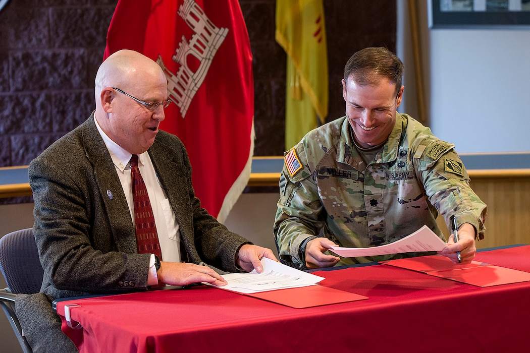 David Gatterman, left, SSCAFCA executive engineer, and Lt. Col. Matthew Miller, Albuquerque District commander, sign a Project Partnership Agreement, Oct. 8, 2024.