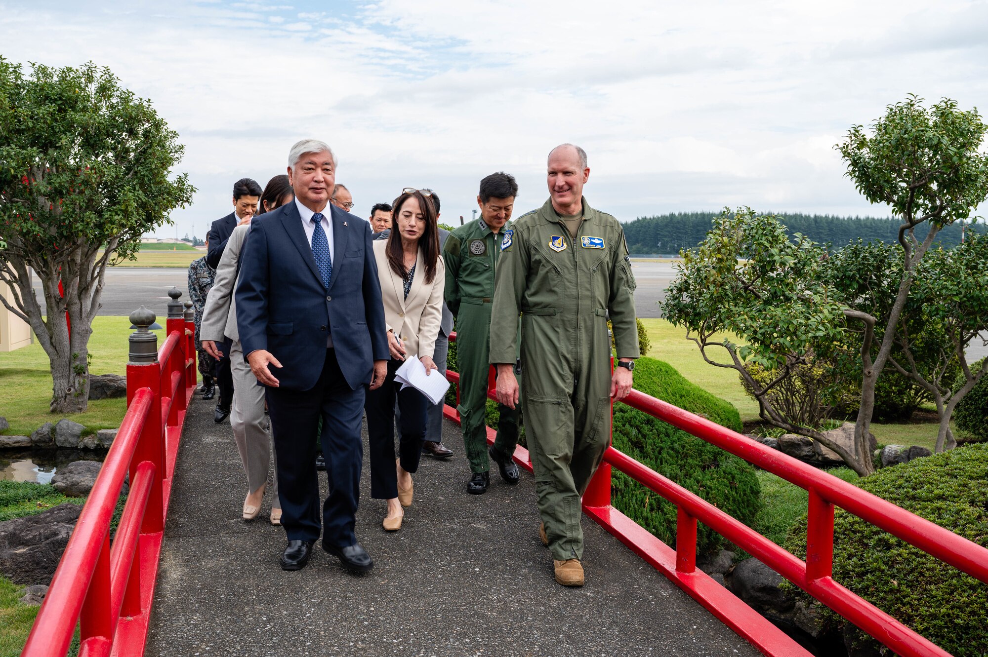 U.S. Air Force Lt. Gen. Stephen Jost, U.S. Forces Japan and Fifth Air Force commander, and Honorable Gen Nakatani, Japan's Minister of Defense, walk through the distinguished visitor garden at Yokota Air Base, Japan.