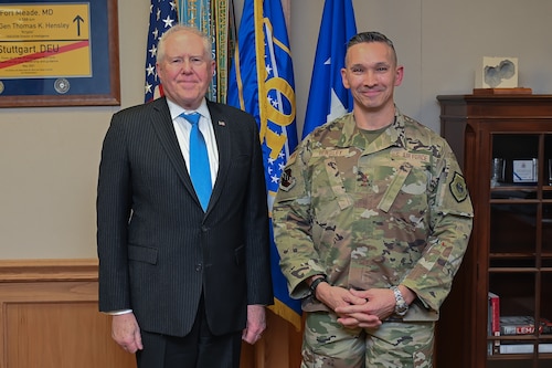 16th Air Force commander poses with Secretary of the Air Force in an office