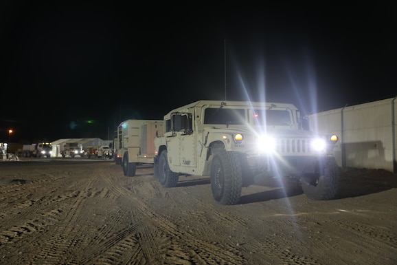 Army Humvee stopped during convoy operations.