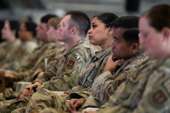 Airmen listen during a commander’s call at Aviano Air Base, Italy.