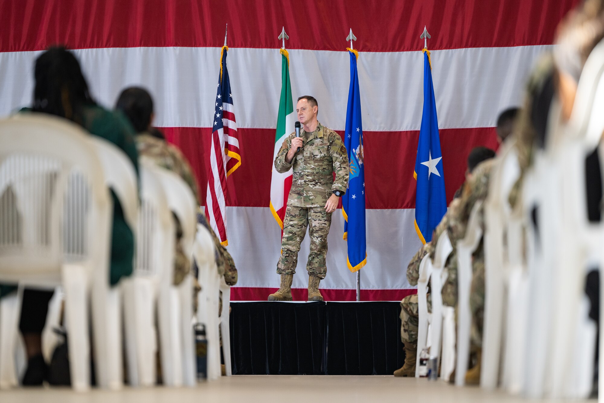 U.S. Air Force Brig. Gen Tad Clark, 31st Fighter Wing commander speaks to Airmen during a commander’s call.