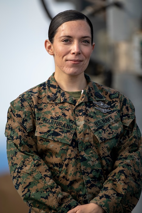 241030-M-FT281-2001 U.S. Navy Hospital Corpsman 1st Class Stacie Marturano with the 24th Marine Expeditionary Unit (MEU) Special Operations Capable (SOC), poses for a photo as the recipient of 2nd Medical Battalion’s Senior Sailor of the Year award aboard the amphibious assault ship USS Wasp (LHD 1) while underway in the Mediterranean Sea, Oct. 30, 2024. The Wasp (WSP) Amphibious Ready Group (ARG) and embarked 24th MEU (SOC) are conducting operations in the U.S. Naval Forces Europe and Africa area of operations on a scheduled deployment. The WSP ARG-24th MEU (SOC) is supporting U.S., Allied and partner interests in the region, including in the Eastern Mediterranean Sea, to continue promoting regional stability and deterring aggression. (U.S. Marine Corps photo by Lance Cpl. John Allen)