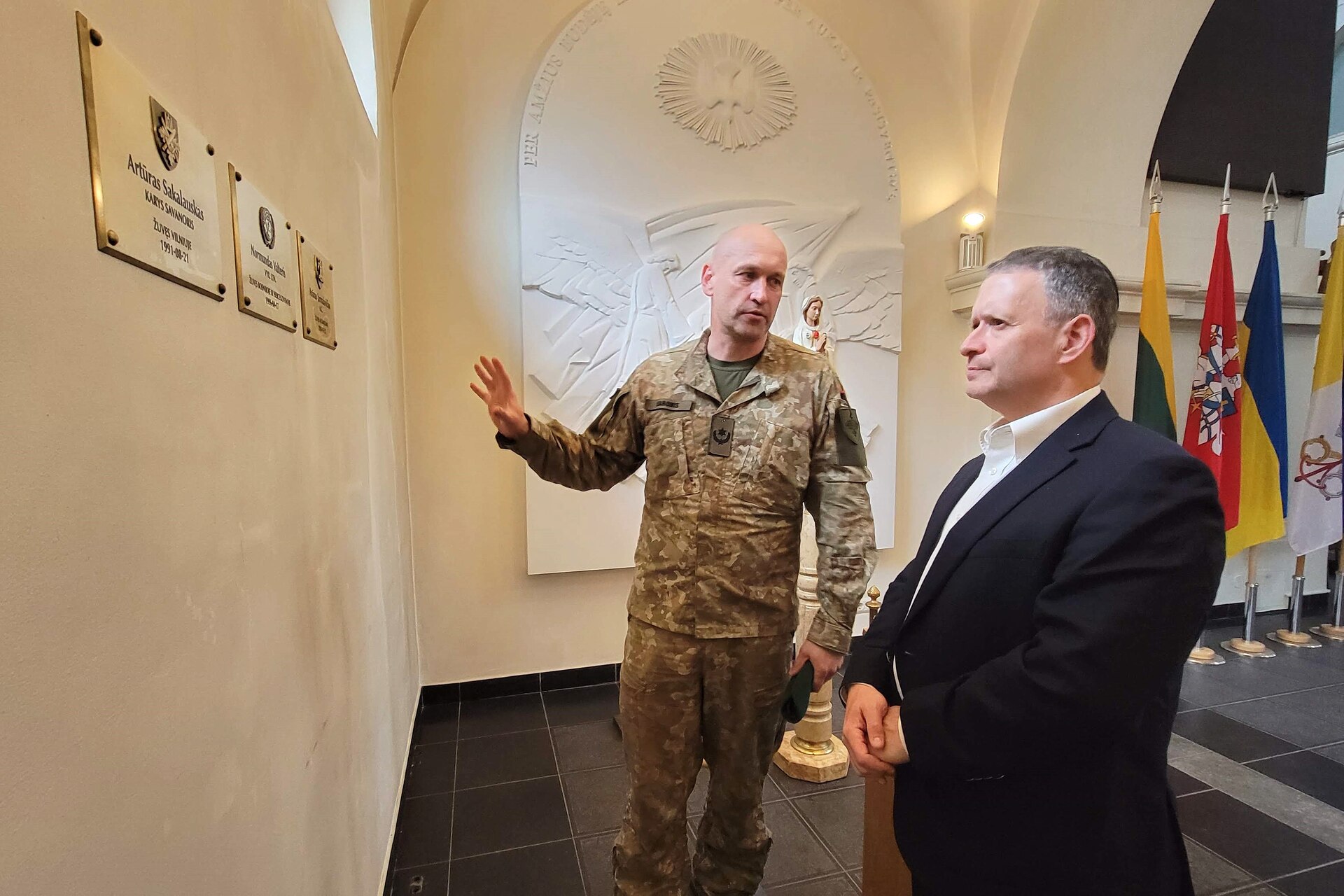 U.S. Army Maj. Aaron Gaber, right, a Jewish chaplain with the 56th Stryker Brigade Combat Team, 28th Infantry Division, Pennsylvania National Guard, is guided around the Cathedral of St. Ignatius of Loyola by Maj. Mindaugas Sabonis, a Military Ordinariate of Lithuania, Oct. 10, 2024. Gaber visited several locations across U.S. European Command to provide religious support to Soldiers celebrating the Jewish High Holy Days. This stop to Vilnius reaffirmed the state partnership that the Pennsylvania National Guard has had with the country of Lithuania since 1993. (U.S. Army National Guard photo by Staff Sgt. John Mateja)