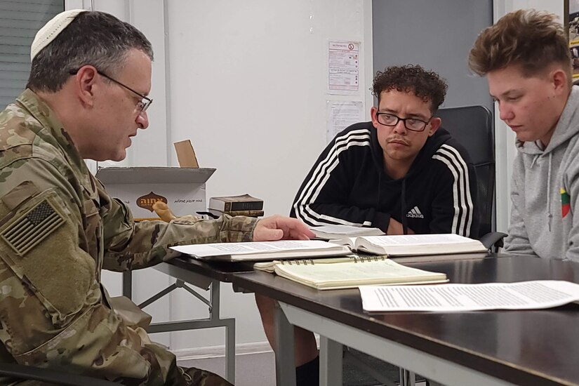 U.S. Army Maj. Aaron Gaber, a Jewish chaplain with the 56th Stryker Brigade Combat Team, 28th Infantry Division, Pennsylvania National Guard, observes the holiday of Yom Kippur with Soldiers and civilians in Lithuania. (U.S. Army National Guard photo by Staff Sgt. John Mateja)