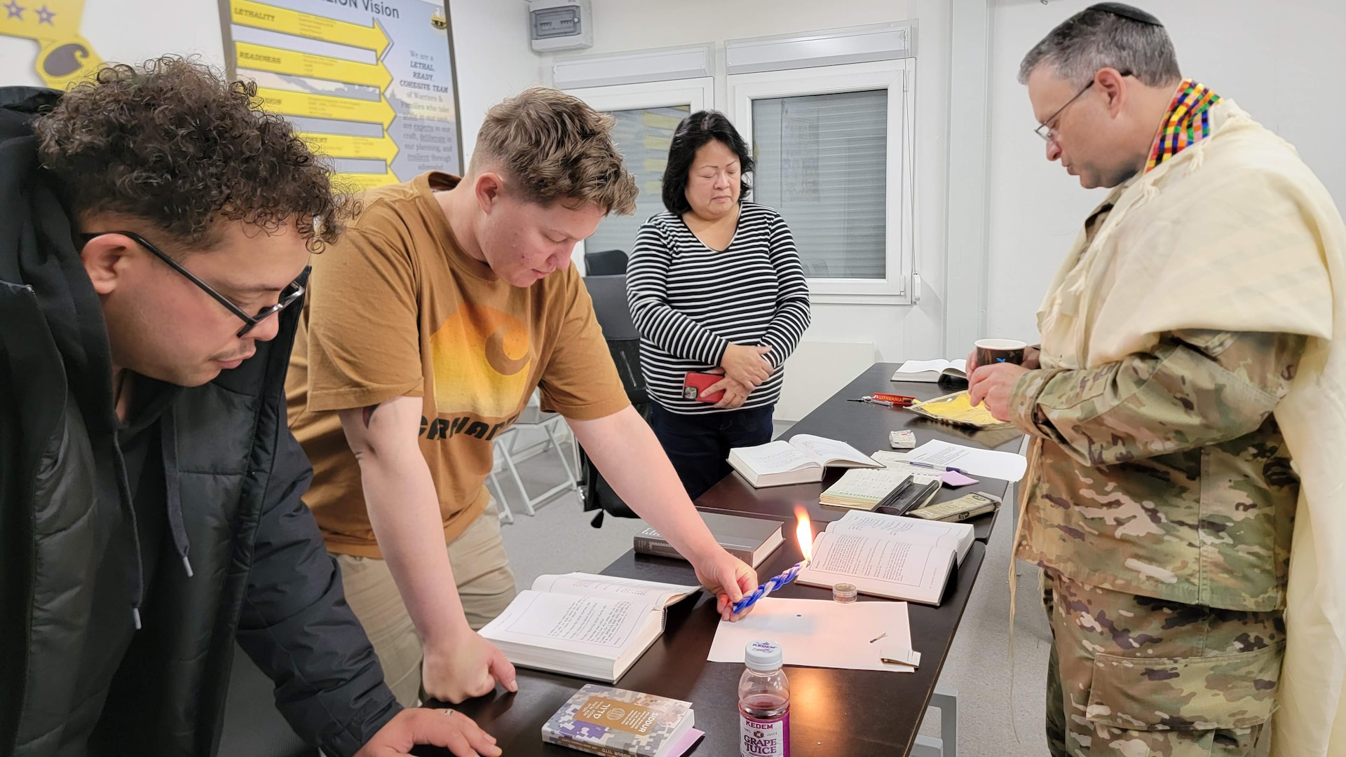 U.S. Army Maj. Aaron Gaber, a Jewish chaplain with the 56th Stryker Brigade Combat Team, 28th Infantry Division, Pennsylvania National Guard, observes the holiday of Yom Kippur with Soldiers and civilians in Lithuania. (U.S. Army National Guard photo by Staff Sgt. John Mateja)
