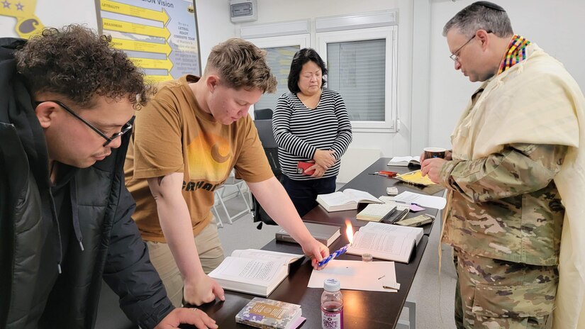 U.S. Army Maj. Aaron Gaber, a Jewish chaplain with the 56th Stryker Brigade Combat Team, 28th Infantry Division, Pennsylvania National Guard, observes the holiday of Yom Kippur with Soldiers and civilians in Lithuania. (U.S. Army National Guard photo by Staff Sgt. John Mateja)