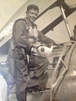 veteran poses for photos