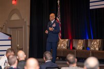 U.S. Air Force Lt. Gen. Brian Robinson, commander of Air Education and Training Command, delivers the keynote speech at the Military Flight Training Conference Oct. 29, 2024, in San Antonio, Texas. The conference brought together over 300 military and industry leaders, aviation trainers, and international delegates focused on the future of pilot training. Lt. Gen. Robinson outlined strategic initiatives to modernize flight curriculum, integrate emerging technologies, and enhance joint training across the U.S. Air Force, Navy, and Army, as well as with allied nations. Robinson emphasized a data-driven approach to address the ongoing pilot shortage, fostering collaboration across branches to equip the next generation of aviators with critical skills for a complex global landscape. (U.S. Air Force photo by Jonathan Mallard)
