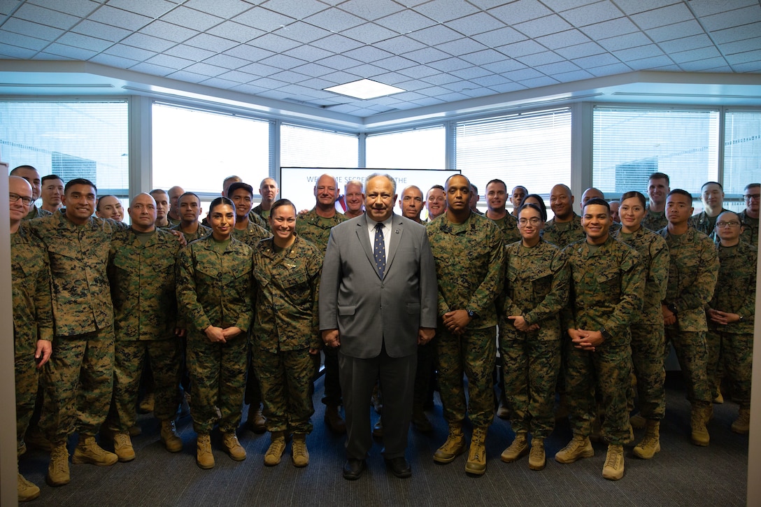 The Secretary of the Navy (SECNAV) Carlos Del Toro recognizes Marines assigned to Manpower Management Enlisted Assignments during a visit to Marine Corps Base Quantico