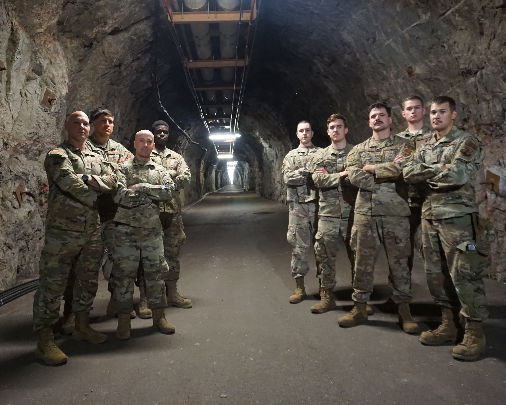 U.S. Air Force Airmen from the 210th Engineering Installation Squadron install over 3,000 feet of secondary fiber optic cable at Cheyenne Mountain Space Force Station, Colorado Springs, Colo., July 31, 2024.