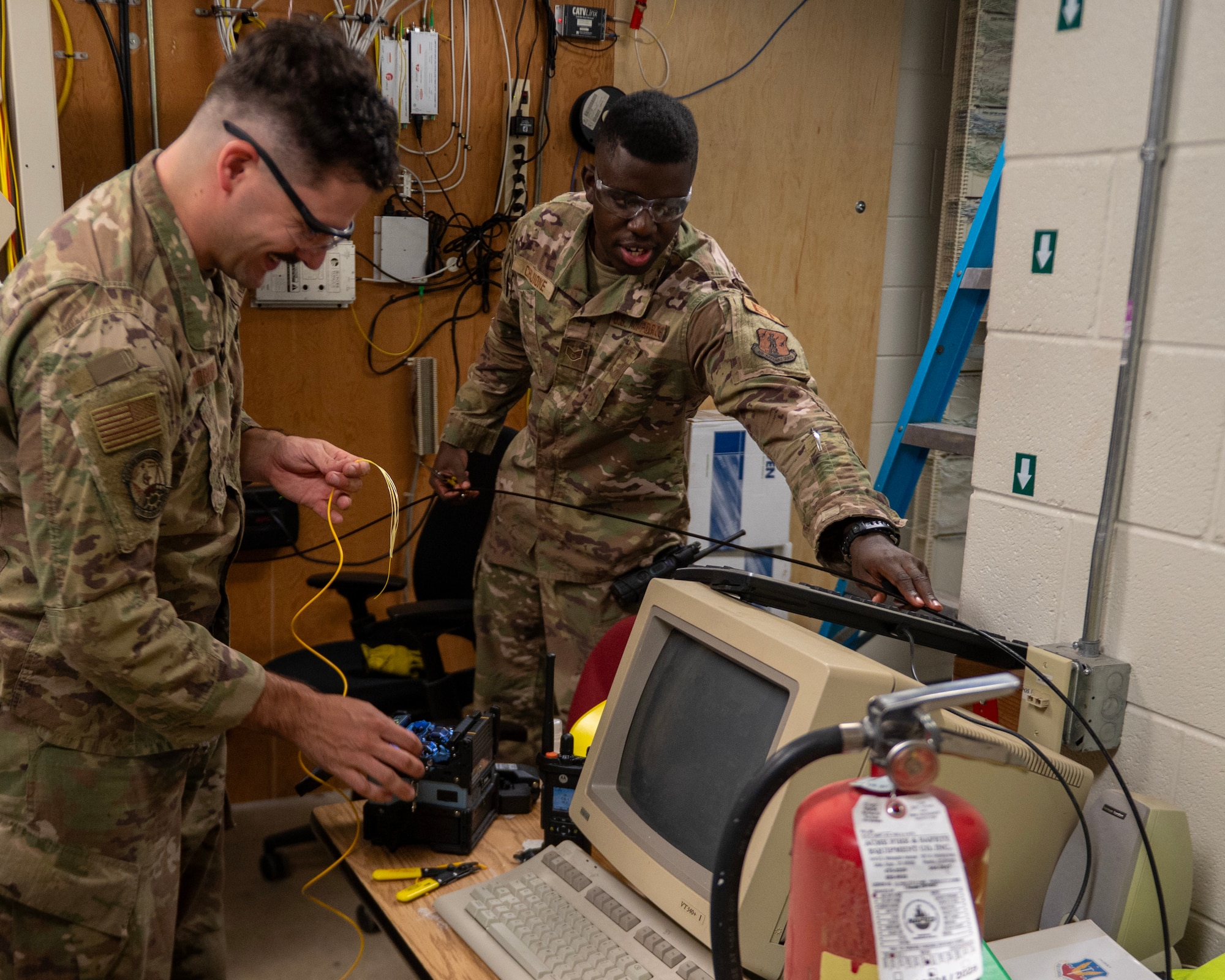 U.S. Air Force Airmen from the 210th Engineering Installation Squadron install over 3,000 feet of secondary fiber optic cable at Cheyenne Mountain Space Force Station, Colorado Springs, Colo., July 31, 2024.
