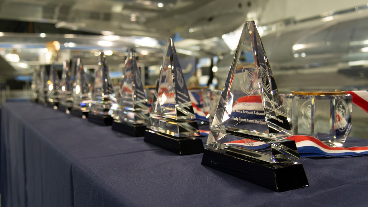 Trophies and awards given to the Air Force Research Laboratory, or AFRL, Fellows and Science and Engineering Early Career Award recipients are displayed at a ceremony at the National Museum of the United States Air Force in Dayton, Ohio, Oct. 24, 2024. The ceremony recognized outstanding scientists and engineers who made significant contributions to the Department of the Air Force in science, technology, engineering or math. (U.S. Air Force photo / Keith Lewis)