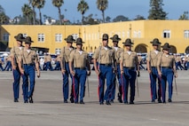 U.S. Marines with Delta Company, 1st Recruit Training Battalion, march in formation during a graduation ceremony at Marine Corps Recruit Depot San Diego, California, Nov. 1, 2024. Graduation took place at the completion of the 13-week transformation, which included training for drill, marksmanship, basic combat skills, and Marine Corps customs and traditions. (U.S. Marine Corps photo by Cpl. Alexander O. Devereux)