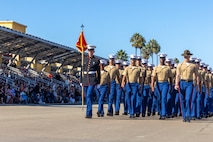 U.S. Marines with Delta Company, 1st Recruit Training Battalion, march across the parade deck during their graduation ceremony at Marine Corps Recruit Depot San Diego, California, Nov. 1, 2024. Graduation took place at the completion of the 13-week transformation, which included training for drill, marksmanship, basic combat skills, and Marine Corps customs and traditions. (U.S. Marine Corps photo by Cpl. Alexander O. Devereux)