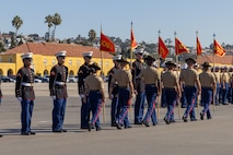 U.S. Marines with Delta Company, 1st Recruit Training Battalion, retire the guidons during their graduation ceremony at Marine Corps Recruit Depot San Diego, California, Nov. 1, 2024. Graduation took place at the completion of the 13-week transformation, which included training for drill, marksmanship, basic combat skills, and Marine Corps customs and traditions. (U.S. Marine Corps photo by Cpl. Alexander O. Devereux)