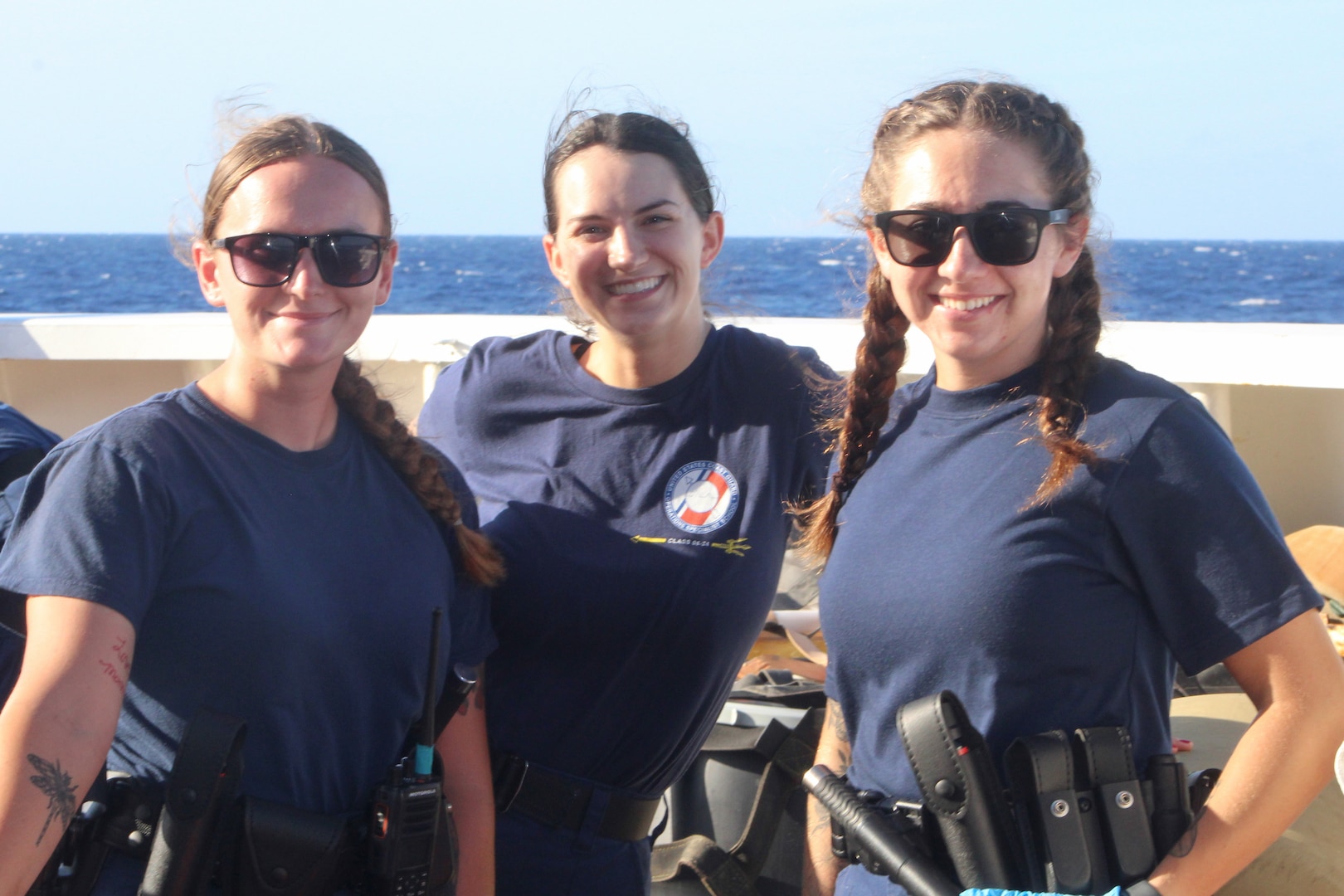 Coast Guard Cutter Reliance (WMEC 615) crew members pose for a photo, Sept. 18, 2024, while at sea in the Windward Passage. After 60 years in service, the cutter completed its first patrol with a fully mixed-gender crew after a project to provide onboard accommodations for female enlisted crew members, increasing opportunities for female Coast Guard members to serve afloat. (U.S. Coast Guard photo by Ensign Sarah Kaleta)