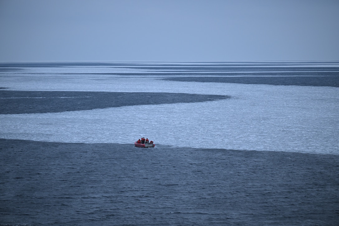 U.S. Coast Guard Cutter Healy (WAGB 20) crewmembers and scientists aboard Healy’s 26-foot cutter-boat large deploy instruments near newly formed sea ice in the Chukchi Sea, Oct. 30, 2024. Healy’s crew has supported the embarked scientists by deploying equipment and instruments for collecting water samples and data throughout their Arctic deployment. U.S. Coast Guard photo by Senior Chief Petty Officer Matt Masaschi.