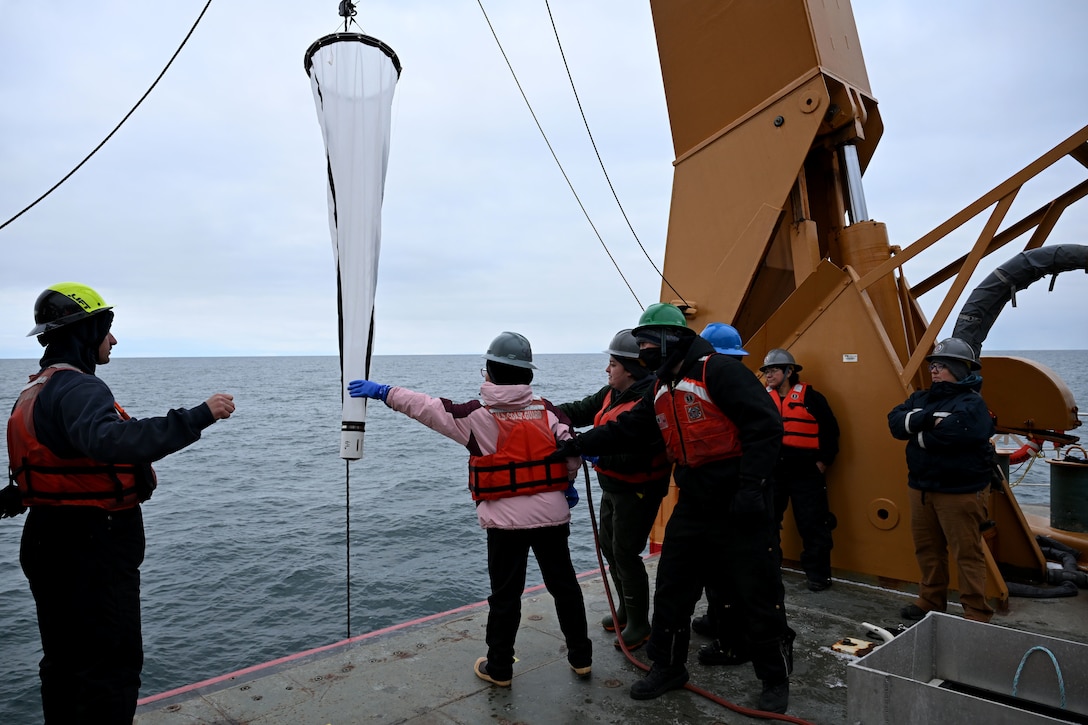 Coast Guard Cutter Healy (WAGB 20) and embarked scientists retrieve a plankton net used for collecting microorganism samples from the Chukchi Sea, Oct. 26, 2024. Healy hosted junior scientists from a variety of institutions during the second phase of their Fall 2024 Arctic deployment supporting the U.S. National Science Foundation-funded Polar Early Career Scientist Training project, with contributions from NOAA and the Coast Guard providing training and research opportunities in the operational areas of the Chukchi and Beaufort seas and within the marginal ice zone. U.S. Coast Guard photo by Senior Chief Petty Officer Matt Masaschi.