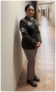 Female Soldier posing in AGSUs