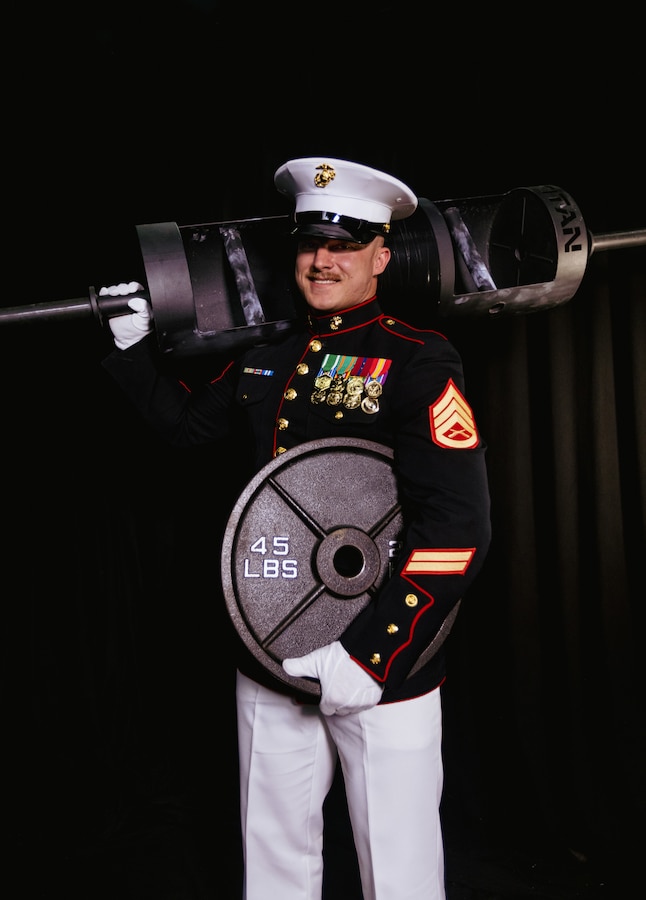 U.S. Marine Corps Staff Sgt. Geoff Laney, an instructor with Marine Corps Engineer School, Training Command, on Marine Corps Base Camp Lejeune, poses for a photo on Marine Corps Base Camp Lejeune, North Carolina, Sept. 26, 2024. Laney, North Carolina's Strongest Man, has claimed victory in seven Strongman competitions, set seven world records, and competed at regional, state, and national levels across the U.S. and in Okinawa, Japan, all while passionately advocating for Marines to take an active role in their personal physical training. (U.S. Marine Corps photo illustration by Cpl. Loriann Dauscher)