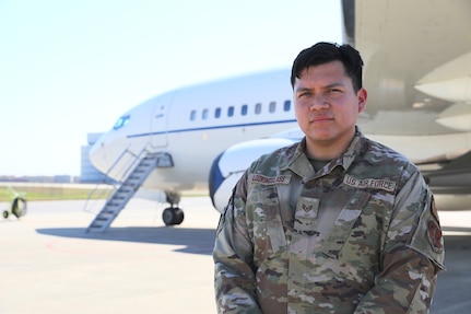 U.S. Air Force Staff Sgt. Jesse Lookingglass, crew chief and mechanic with the 213th Maintenance Squadron, District of Columbia Air National Guard, stands for a photograph in front of a C-40 aircraft at Joint Base Andrews, Oct. 22, 2024. These inspections are crucial for ensuring the aircraft is mission-ready, identifying potential issues before takeoff, and maintaining the safety and reliability needed for every operation. The aircraft SSgt Lookingglass maintains provides world-class travel for members of the Executive Branch, Congress, Department of Defense, and high-ranking U.S. foreign dignitaries.