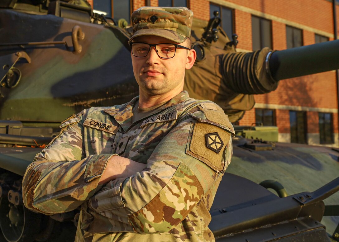 U.S. Army Spc. Mason Corzine, a fire control specialist assigned to V Corps, stands outside of the V Corps headquarters building, Fort Knox, Ky., Nov. 5, 2024. Corzine prepared for a future outside of the Army by utilizing multiple resources that Fort Knox has to offer, such as the installation’s Transition Assistance Program. (U.S. Army photo by Sgt. Devin Klecan)