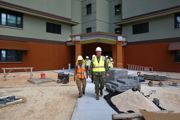 U.S. Navy Capt. Blake Burket from the Office In Charge of Construction Marine Corps Marianas conducts a tour of active construction sites on Marine Corps Base Camp Blaz