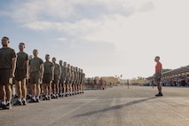 U.S. Marines with Delta Company, 1st Recruit Training Battalion, stand in formation before their motivational run at MCRD San Diego, California, Oct. 31, 2024. The company motivational run is a three-mile cadence run conducted around the Depot and is the last physical training event the Marines will conduct before the graduate from MCRD San Diego. The event is also the first time friends and families will see their newly transformed Marines. (U.S. Marine Corps photo by Cpl. Sarah M. Grawcock)