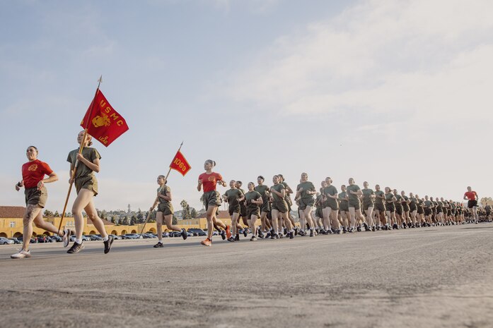 U.S. Marines with Delta Company, 1st Recruit Training Battalion, run in formation before their motivational run at Marine Corps Recruit Depot San Diego, California, Oct. 31, 2024. The company motivational run is a three-mile cadence run conducted around the Depot and is the last physical training event the Marines will conduct before the graduate from MCRD San Diego. The event is also the first time friends and families will see their newly transformed Marines. (U.S Marine Corps  photo by Cpl. Sarah M. Grawcock)