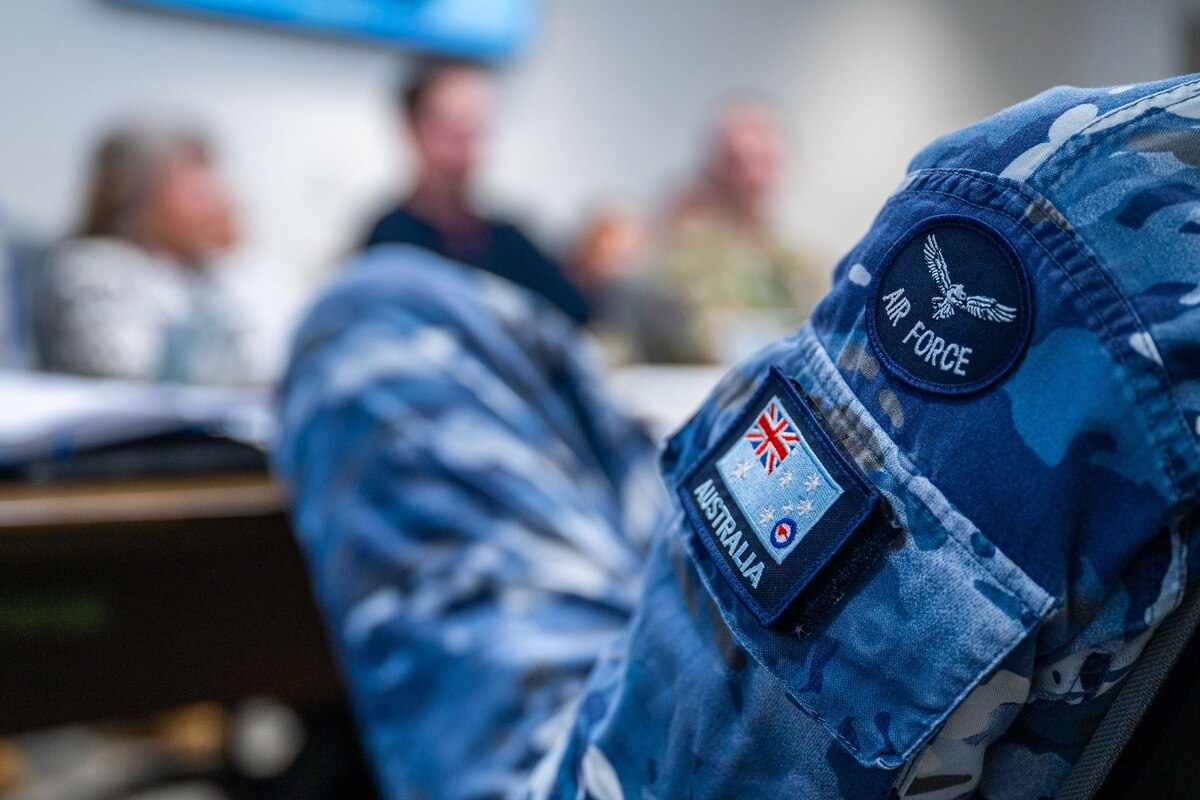 An Australian Air Force patch is shown on the sleeve of a military member.