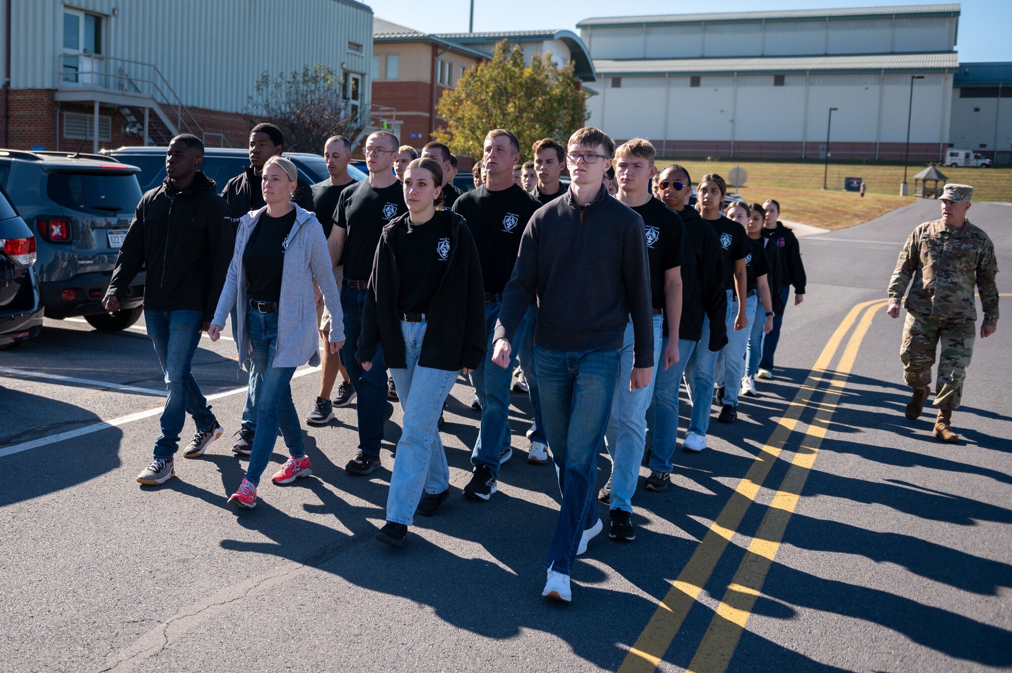 A group of trainees marches in formation