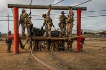 U.S. Marine Corps recruits with Mike Company, 3rd Recruit Training Battalion, navigate an obstacle during the Crucible at Marine Corps Base Camp Pendleton, California, Oct. 29, 2024. The Crucible is a 54-hour exercise where recruits apply the knowledge they learned throughout recruit training to earn the title United States Marine. (U.S. Marine Corps photo by Lance Cpl. Jacob B. Hutchinson)