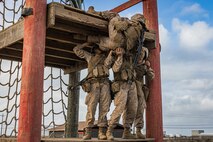 U.S. Marine Corps recruits with Mike Company, 3rd Recruit Training Battalion, navigate an obstacle during the Crucible at Marine Corps Base Camp Pendleton, California, Oct. 29, 2024. The Crucible is a 54-hour exercise where recruits apply the knowledge they learned throughout recruit training to earn the title United States Marine. (U.S. Marine Corps photo by Lance Cpl. Jacob B. Hutchinson)