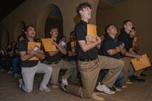 U.S. Marine Corps recruits with Bravo Company, 1st Recruit Training Battalion, are briefed on the Uniform Code of Military Justice as part of a receiving event at Marine Corps Recruit Depot San Diego, California, Oct. 28, 2024. During the receiving process, recruits are taken to the United States Organizations for accountability, checked for contraband, given haircuts, make scripted phone calls home, and issued gear required for training. (U.S. Marine Corps photo by Cpl. Sarah M. Grawcock)