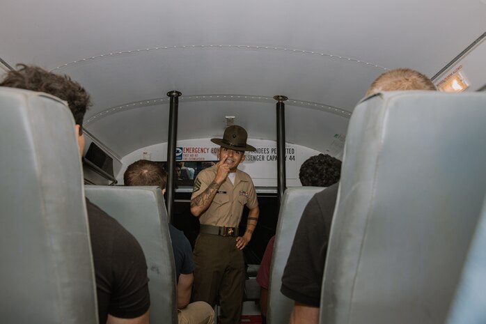 U.S. Marine Corps Staff Sgt. Manuel Rubio, a drill instructor with Receiving Company, Support Battalion, instructs recruits during the Bravo Company, 1st Recruit Training Battalion receiving event at Marine Corps Recruit Depot San Diego, California, Oct. 28, 2024. During the receiving process, recruits are taken to the United States Organizations for accountability, checked for contraband, given haircuts, make scripted phone calls home, and issued gear required for training. (U.S. Marine Corps photo by Cpl. Sarah M. Grawcock)