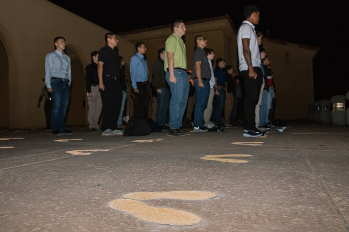 U.S. Marine Corps recruits with Bravo Company, 1st Recruit Training Battalion, are briefed as part of a receiving event at Marine Corps Recruit Depot San Diego, California, Oct. 28, 2024. During the receiving process, recruits are taken to the United States Organizations for accountability, checked for contraband, given haircuts, make scripted phone calls home, and issued gear required for training. (U.S. Marine Corps photo by Cpl. Sarah M. Grawcock)