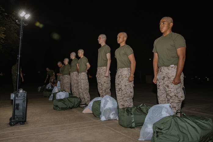 U.S. Marine Corps recruits with Bravo Company, 1st Recruit Training Battalion, are issued gear as part of a receiving event at Marine Corps Recruit Depot San Diego, California, Oct. 28, 2024. During the receiving process, recruits are taken to the United States Organizations for accountability, checked for contraband, given haircuts, make scripted phone calls home, and issued gear required for training. (U.S. Marine Corps photo by Cpl. Sarah M. Grawcock)