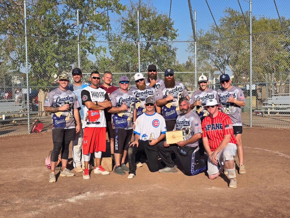 The “Oklahoma Guzzlers” pose for a photo following an Armed Services Softball Championships game at Altus, Oklahoma, Oct. 12, 2024. The Guzzlers are a team comprised of active duty and retired Soldiers and Airmen from Altus and Fort Sill, Oklahoma. (courtesy photo)